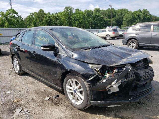 FORD FOCUS SE 2016 with VIN 1FADP3F24GL300808 - Photo from auction