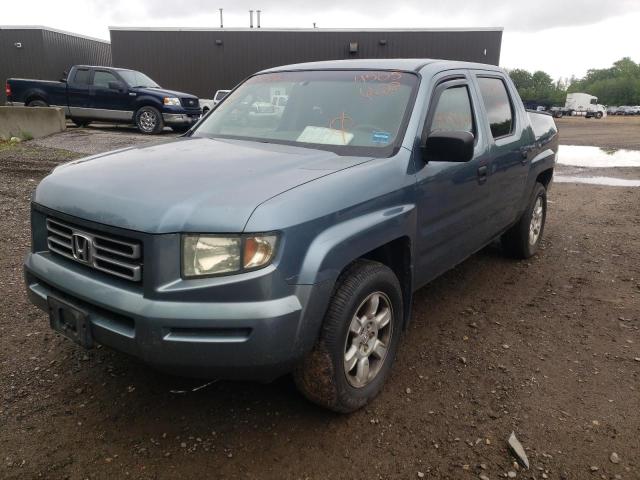 Photo 2 from auction – 2006 HONDA RIDGELINE with VIN 2HJYK16276H569293