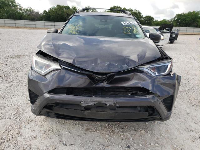 Photo 9 from auction – 2017 TOYOTA RAV4 LE with VIN JTMZFREV3HJ123487