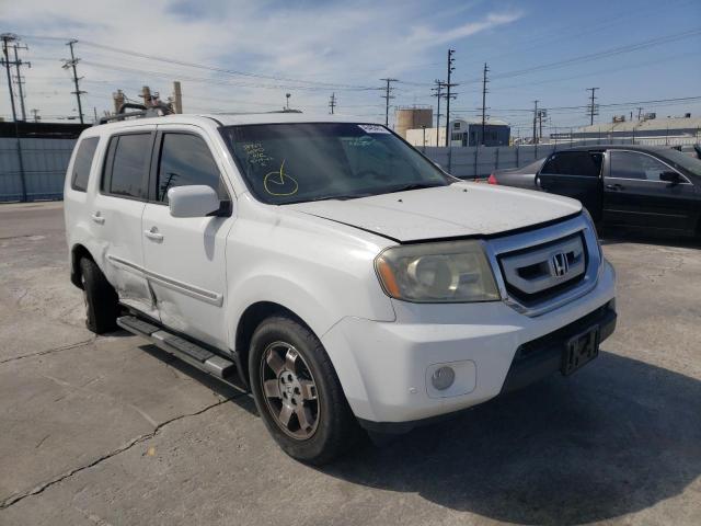 HONDA PILOT TOUR 2011 with VIN 5FNYF3H98BB041244 - Photo from auction