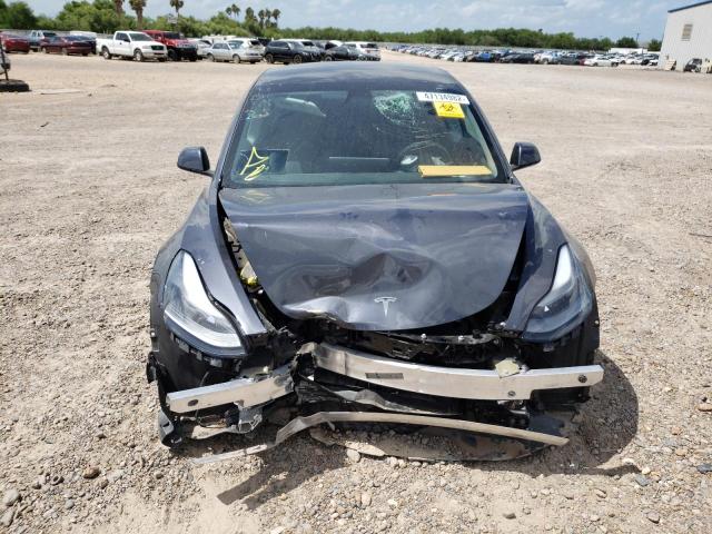 Photo 9 from auction – 2021 TESLA MODEL 3 with VIN 5YJ3E1EBXMF974610