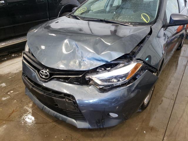 Photo 9 from auction – 2014 TOYOTA COROLLA EC with VIN 5YFBPRHE1EP029108