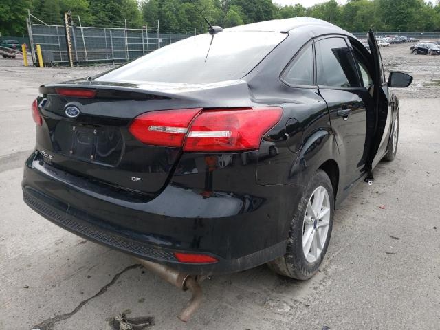 Photo 4 from auction – 2018 FORD FOCUS SE with VIN 1FADP3F20JL275879