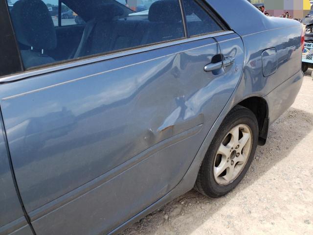 Photo 9 from auction – 2002 TOYOTA CAMRY LE with VIN JTDBE32K420015937