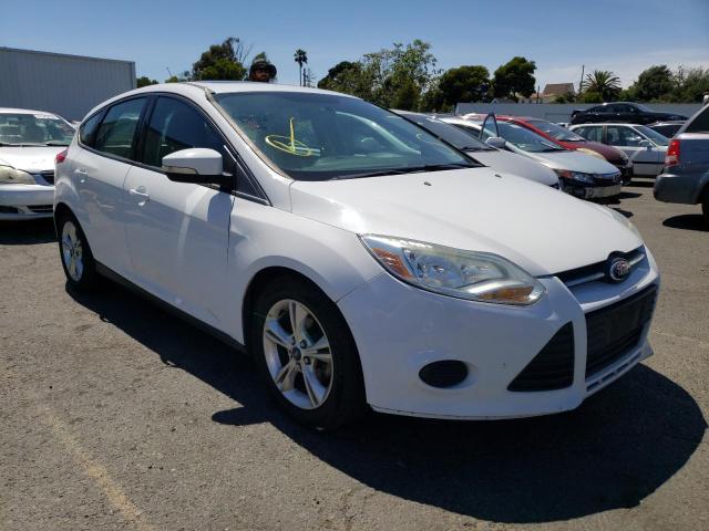 FORD FOCUS SE 2014 with VIN 1FADP3K26EL260749 - Photo from auction