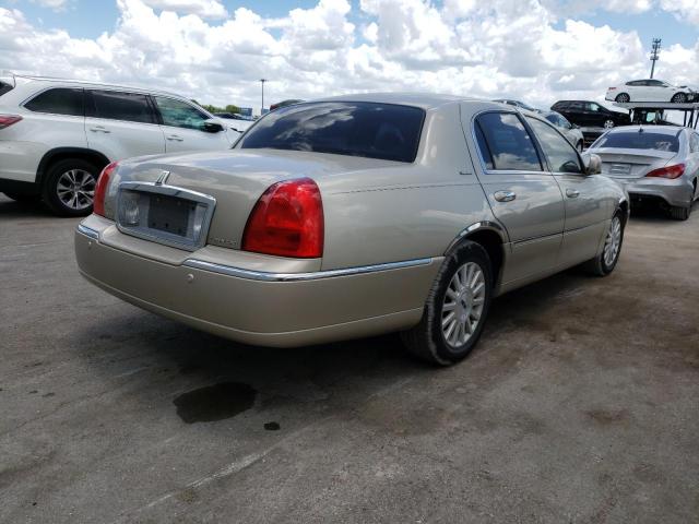 Photo 4 from auction – 2004 LINCOLN TOWN CAR E with VIN 1LNHM81W94Y641269