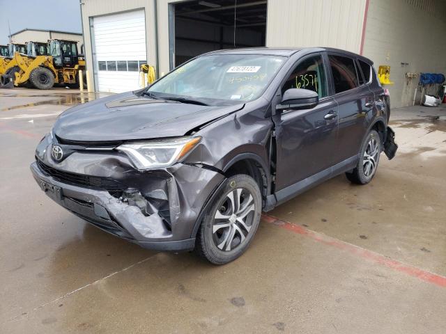 Photo 2 from auction – 2018 TOYOTA RAV4 LE with VIN 2T3ZFREV8JW450457