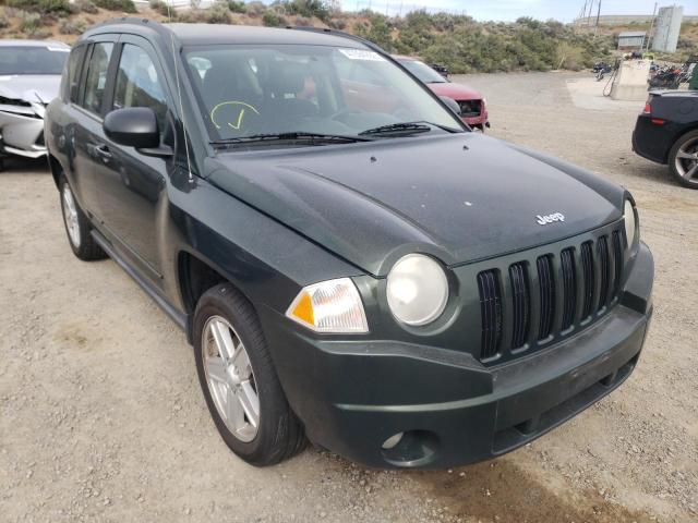 JEEP COMPASS SP 2010 with VIN 1J4NF4FB0AD592928 - Photo from auction