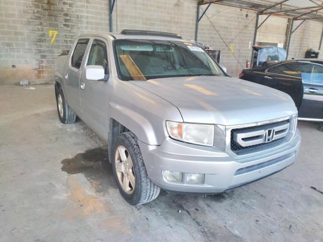 HONDA RIDGELINE 2011 with VIN 5FPYK1F58BB010647 - Photo from auction