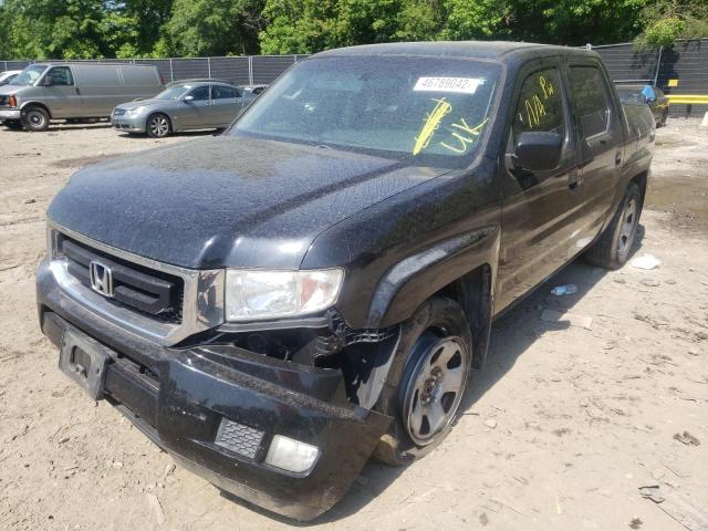 Photo 9 from auction – 2011 HONDA RIDGELINE with VIN 5FPYK1F2XBB002698