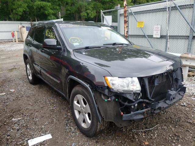 JEEP GRAND CHER 2011 with VIN 1J4RR4GG8BC670690 - Photo from auction