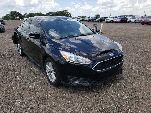 FORD FOCUS 2017 with VIN 1FADP3F2XHL227106 - Photo from auction