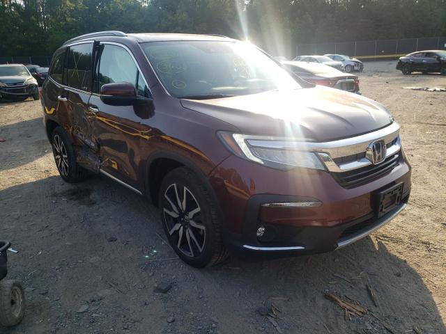HONDA PILOT TOUR 2019 with VIN 5FNYF6H67KB039296 - Photo from auction