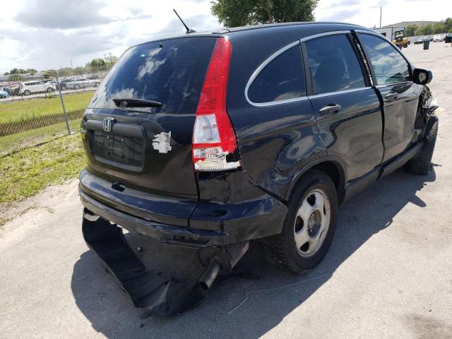 Photo 4 from auction – 2011 HONDA CR-V LX with VIN 5J6RE3H33BL050914
