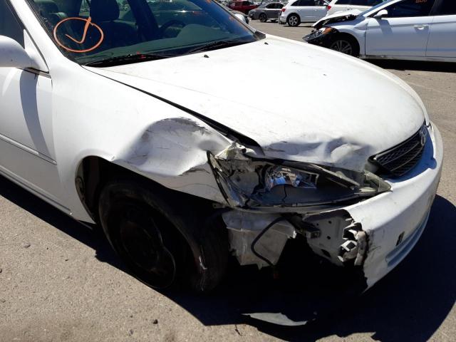 Photo 9 from auction – 2003 TOYOTA CAMRY LE with VIN JTDBE32K830177880