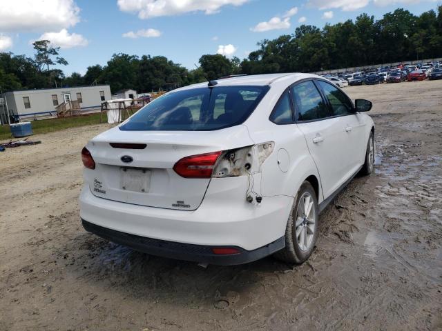 Photo 4 from auction – 2016 FORD FOCUS SE with VIN 1FADP3F25GL348575