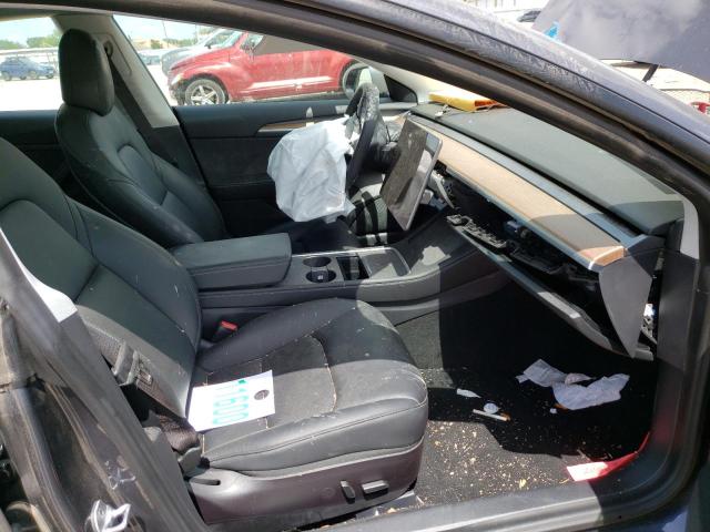 Photo 5 from auction – 2021 TESLA MODEL 3 with VIN 5YJ3E1EBXMF974610