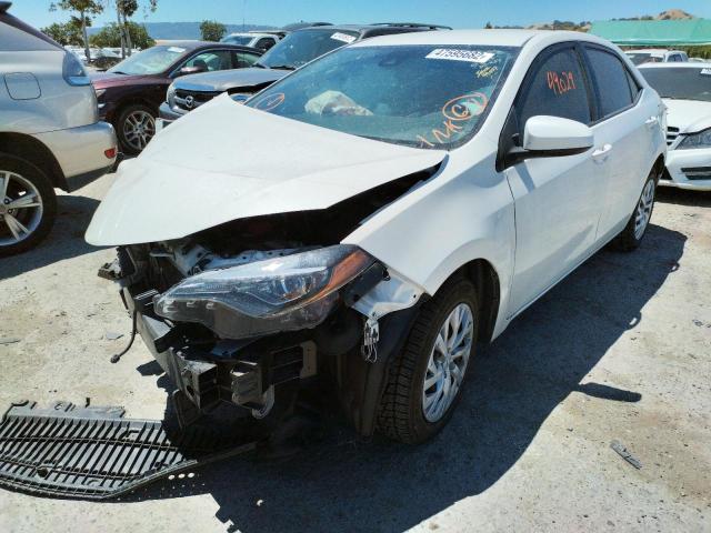 Photo 2 from auction – 2018 TOYOTA COROLLA L with VIN 5YFBURHE6JP807857