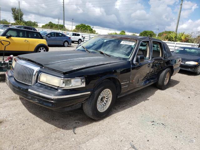 Photo 2 from auction – 1997 LINCOLN TOWN CAR E with VIN 1LNLM81W2VY711030