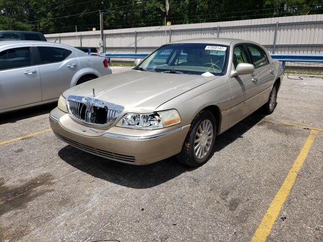 Photo 2 from auction – 2004 LINCOLN TOWN CAR E with VIN 1LNHM81W84Y669774