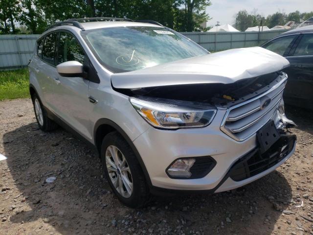 FORD ESCAPE SE 2018 with VIN 1FMCU9GD8JUC99144 - Photo from auction