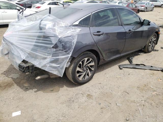 Photo 4 from auction – 2018 HONDA CIVIC EX with VIN 2HGFC2F70JH523230