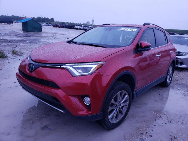 Photo 2 from auction – 2016 TOYOTA RAV4 LIMIT with VIN JTMYFREV9GJ071079