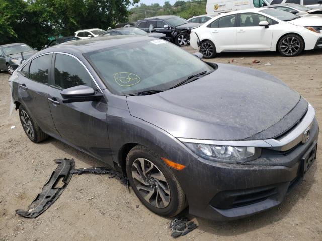 HONDA CIVIC EX 2018 with VIN 2HGFC2F70JH523230 - Photo from auction