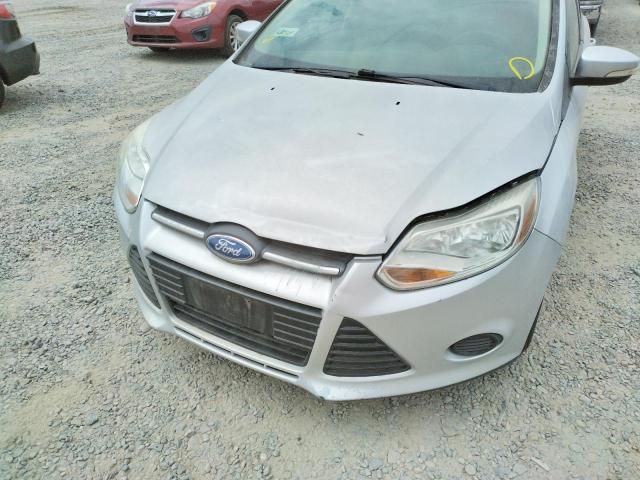 Foto 9 de la subasta – 2014 FORD FOCUS SE con VIN 1FADP3K29EL295575