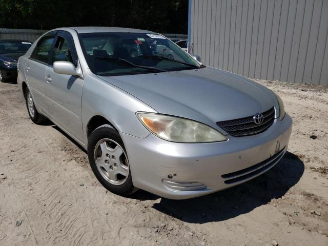 TOYOTA CAMRY LE 2002 with VIN 4T1BF32K12U021728 - Photo from auction