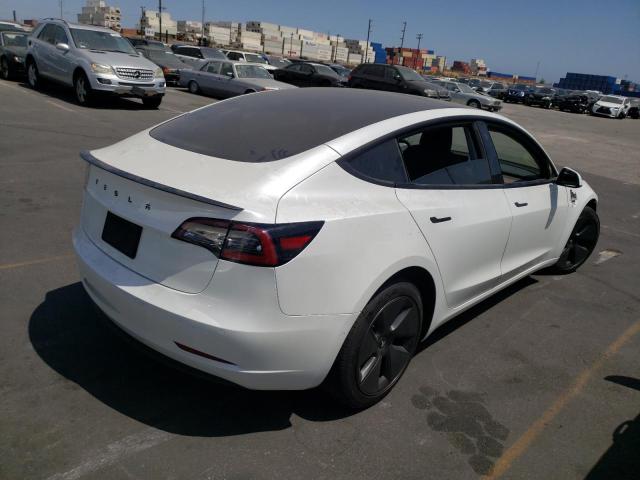 Photo 4 from auction – 2021 TESLA MODEL 3 with VIN 5YJ3E1EA7MF940308