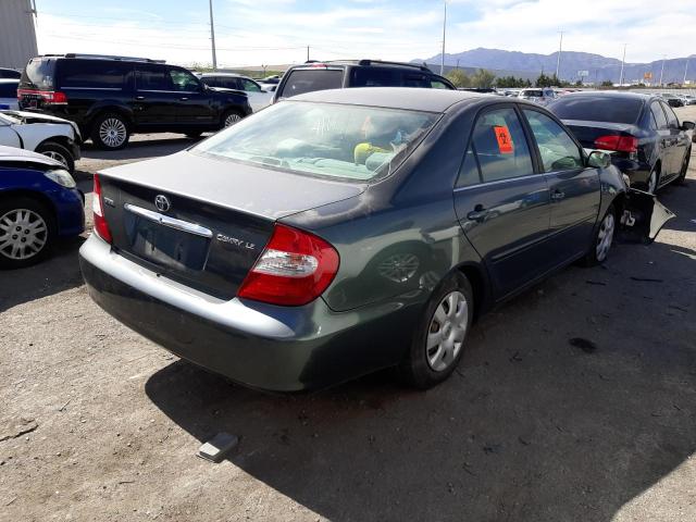 Photo 4 from auction – 2002 TOYOTA CAMRY LE with VIN JTDBE32K520096382