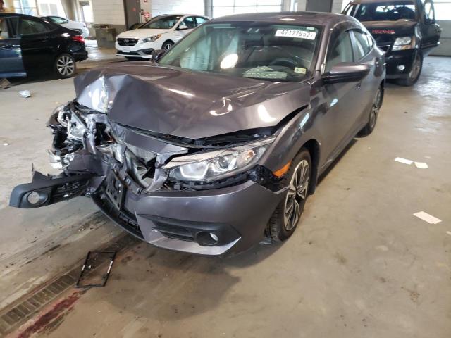 Photo 2 from auction – 2017 HONDA CIVIC EX with VIN 2HGFC1F39HH649426