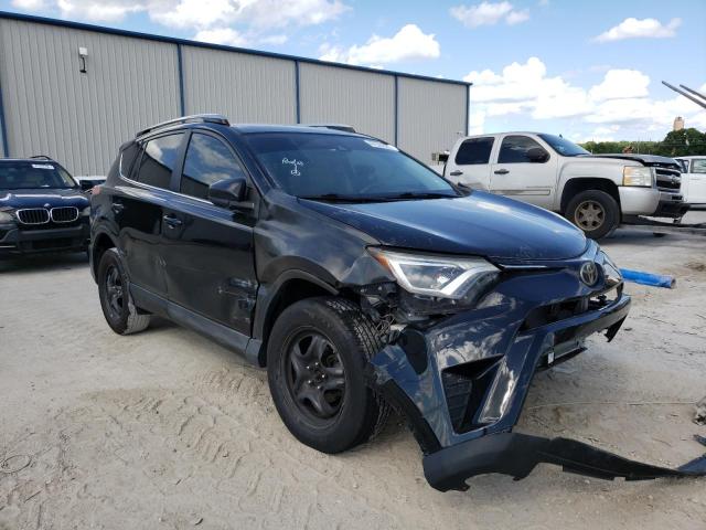 TOYOTA RAV4 LE 2018 with VIN 2T3ZFREV2JW416336 - Photo from auction