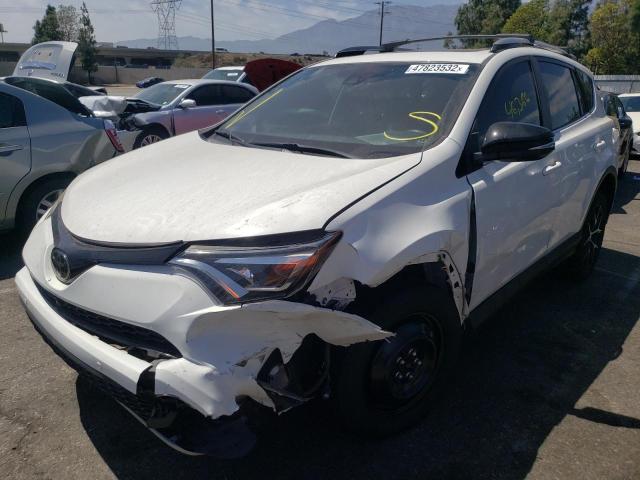 Photo 2 from auction – 2018 TOYOTA RAV4 SE with VIN JTMNFREV3JJ153626