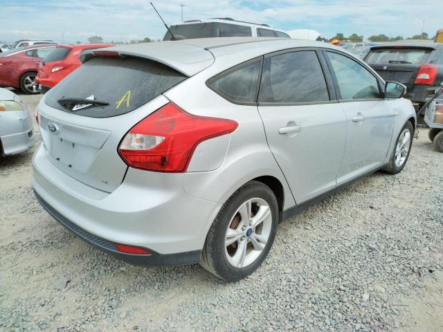 Foto 4 de la subasta – 2014 FORD FOCUS SE con VIN 1FADP3K29EL295575