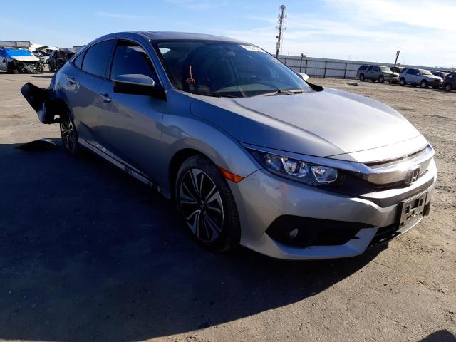 HONDA CIVIC EX 2018 with VIN JHMFC1F39JX033224 - Photo from auction