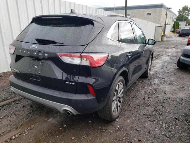 Photo 4 from auction – 2021 FORD ESCAPE TIT with VIN 1FMCU9J94MUA56990