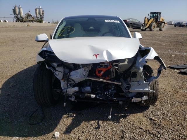 Photo 9 from auction – 2020 TESLA MODEL Y with VIN 5YJYGDEEXLF056625