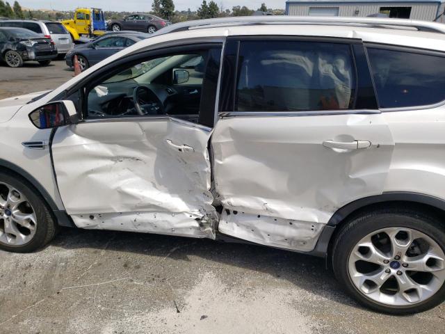 Photo 9 from auction – 2014 FORD ESCAPE TIT with VIN 1FMCU0JX9EUB47927