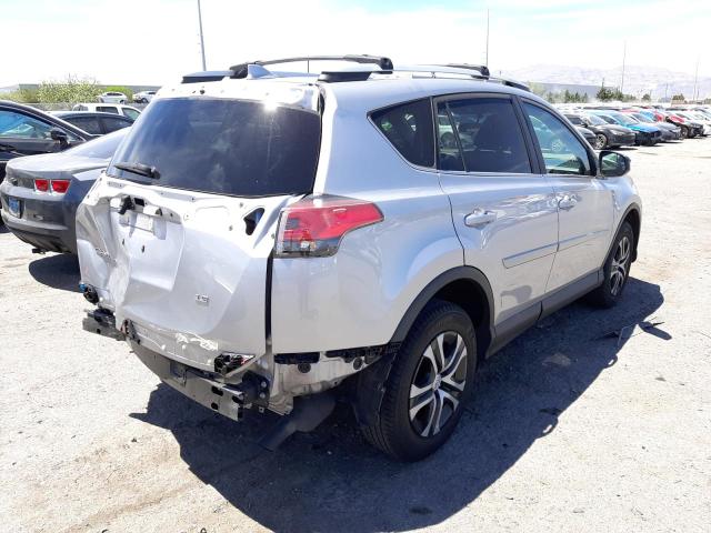 Photo 4 from auction – 2016 TOYOTA RAV4 LE with VIN 2T3ZFREV7GW309209