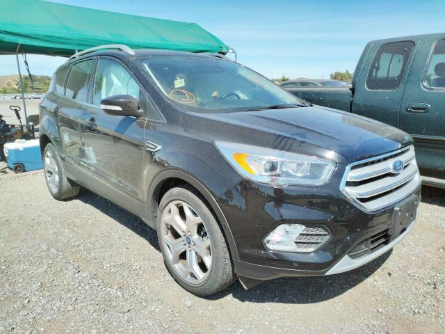 FORD ESCAPE TIT 2019 with VIN 1FMCU0J99KUC31811 - Photo from auction