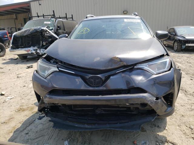Photo 9 from auction – 2016 TOYOTA RAV4 LE with VIN JTMBFREV6GJ062622