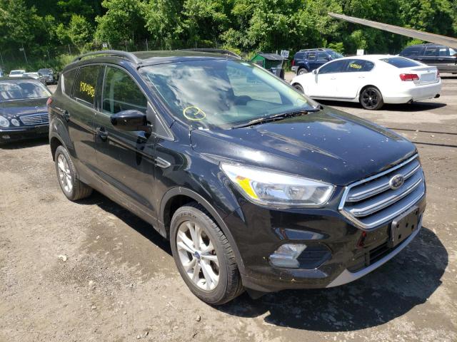 FORD ESCAPE SE 2018 with VIN 1FMCU9GD7JUC01320 - Photo from auction