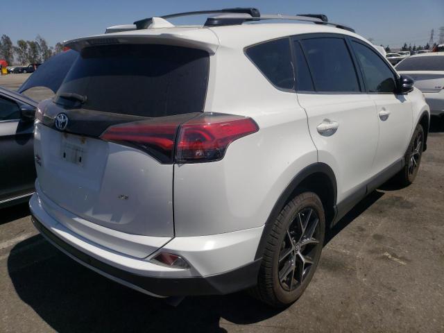 Photo 4 from auction – 2018 TOYOTA RAV4 SE with VIN JTMNFREV3JJ153626