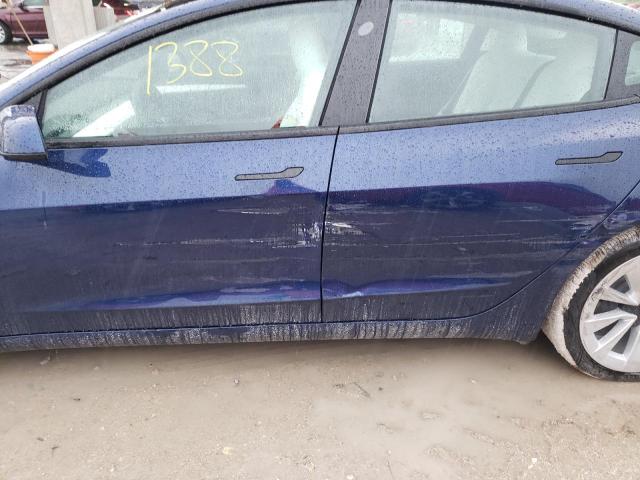 Photo 9 from auction – 2022 TESLA MODEL 3 with VIN 5YJ3E1EB4NF180896