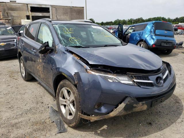 TOYOTA RAV4 XLE 2014 with VIN 2T3RFREV9EW197929 - Photo from auction