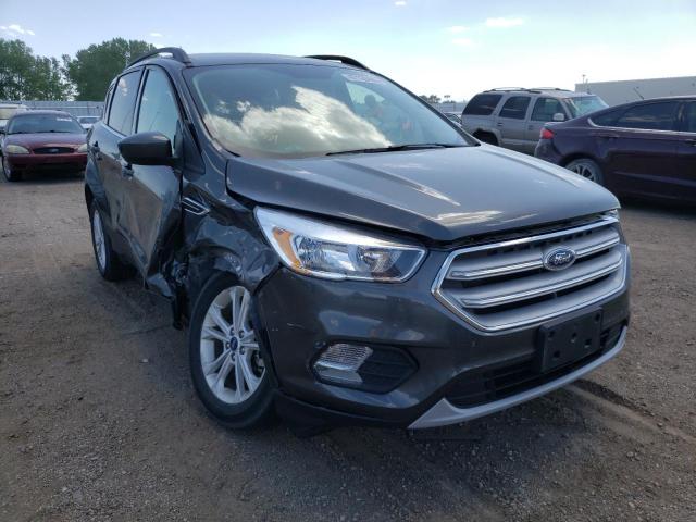 FORD ESCAPE SE 2018 with VIN 1FMCU9G92JUC20868 - Photo from auction