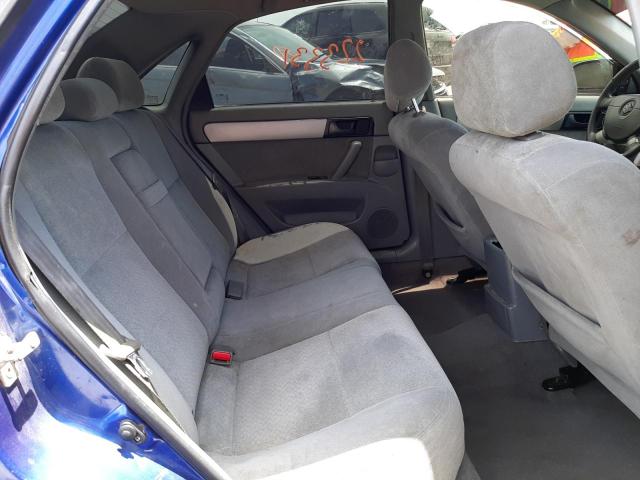 Photo 6 from auction – 2004 SUZUKI FORENZA S with VIN KL5JD52Z94K064054