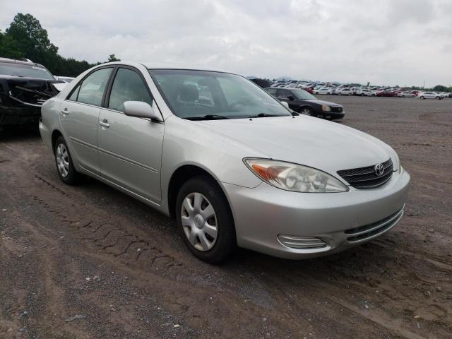 TOYOTA CAMRY LE 2002 with VIN JTDBE32K720022302 - Photo from auction